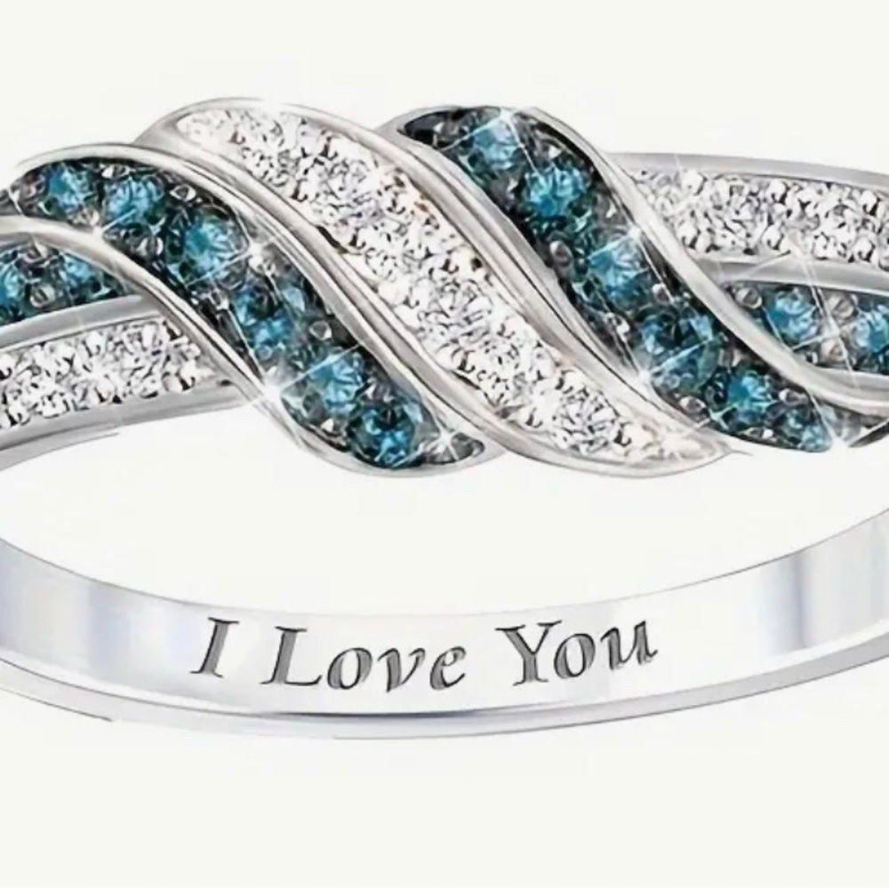 Silvery zirconia ring size 6 inscribed inside “I love you”